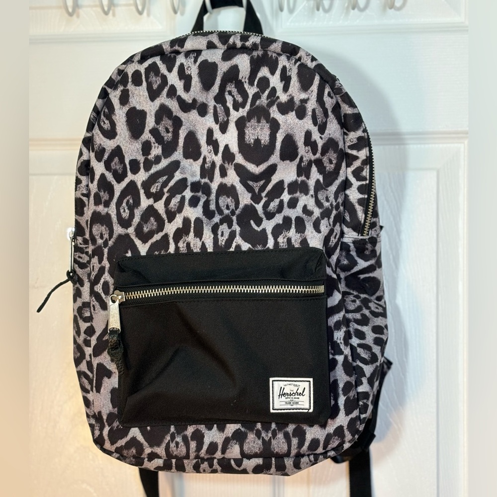 Like New Herschel laptop backpack, snow leopard and black print.